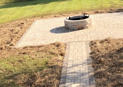 outdoor walkway and fireplace in knoxville backyard